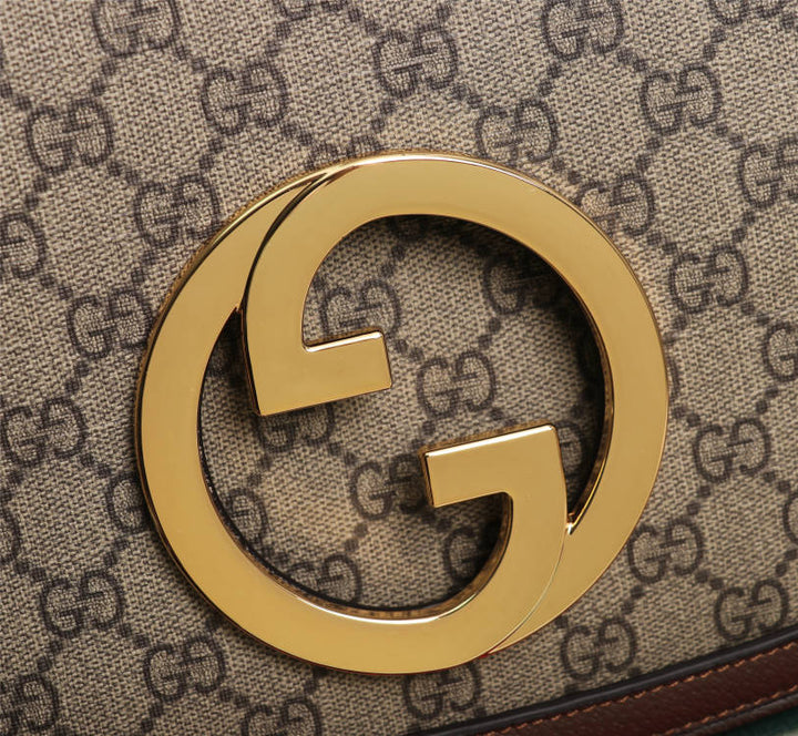 Crossbody bag with round logo in gold color