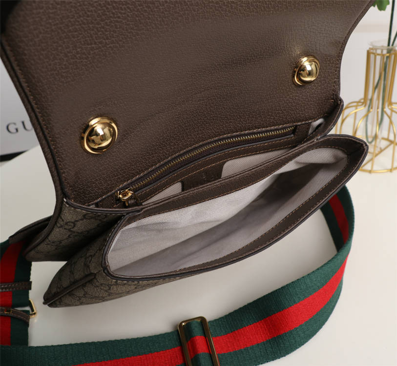 Crossbody bag with round logo in gold color