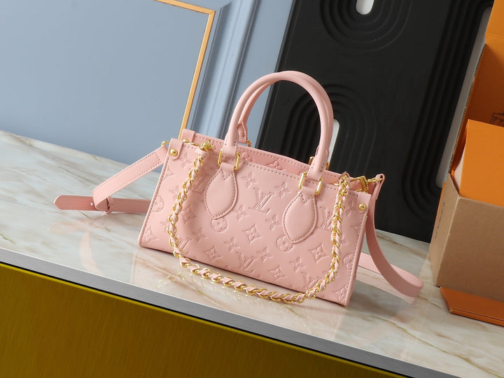 Embossed cowhide handbag