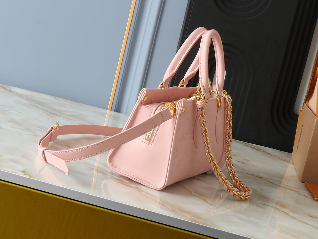 Embossed cowhide handbag