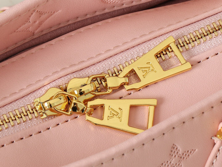 Embossed cowhide handbag