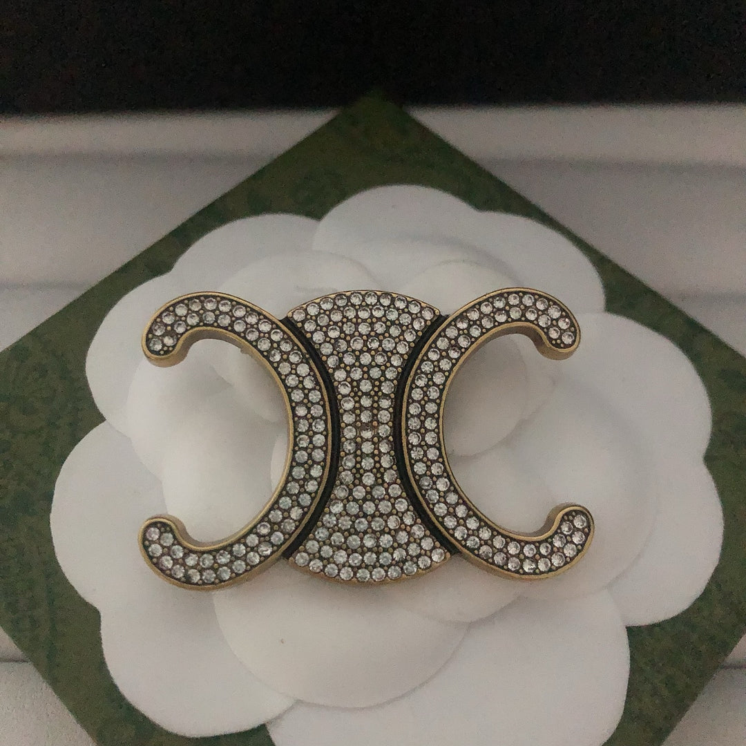 Exclusive Logo Rhinestone Brooch