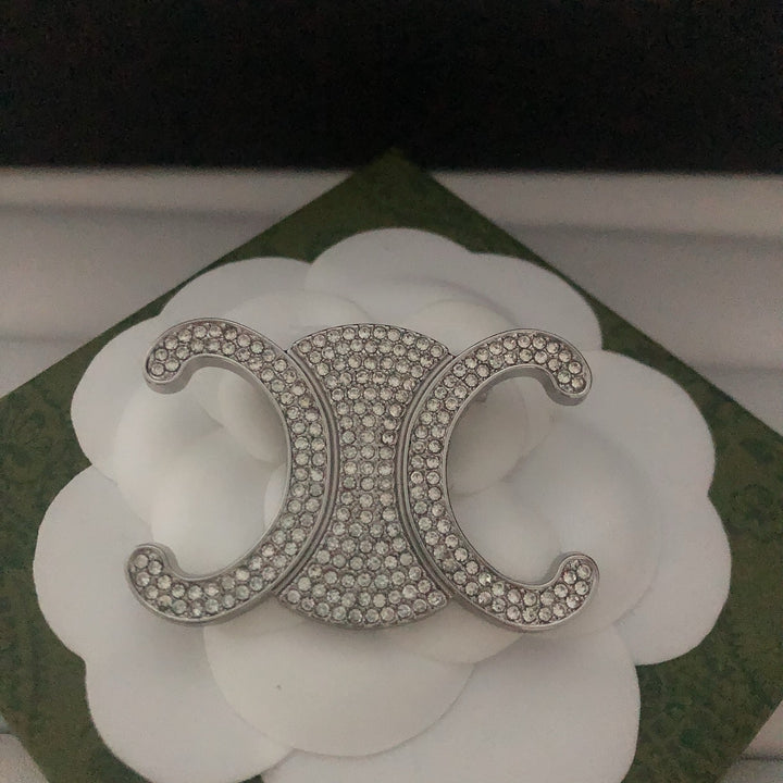 Exclusive Logo Rhinestone Brooch