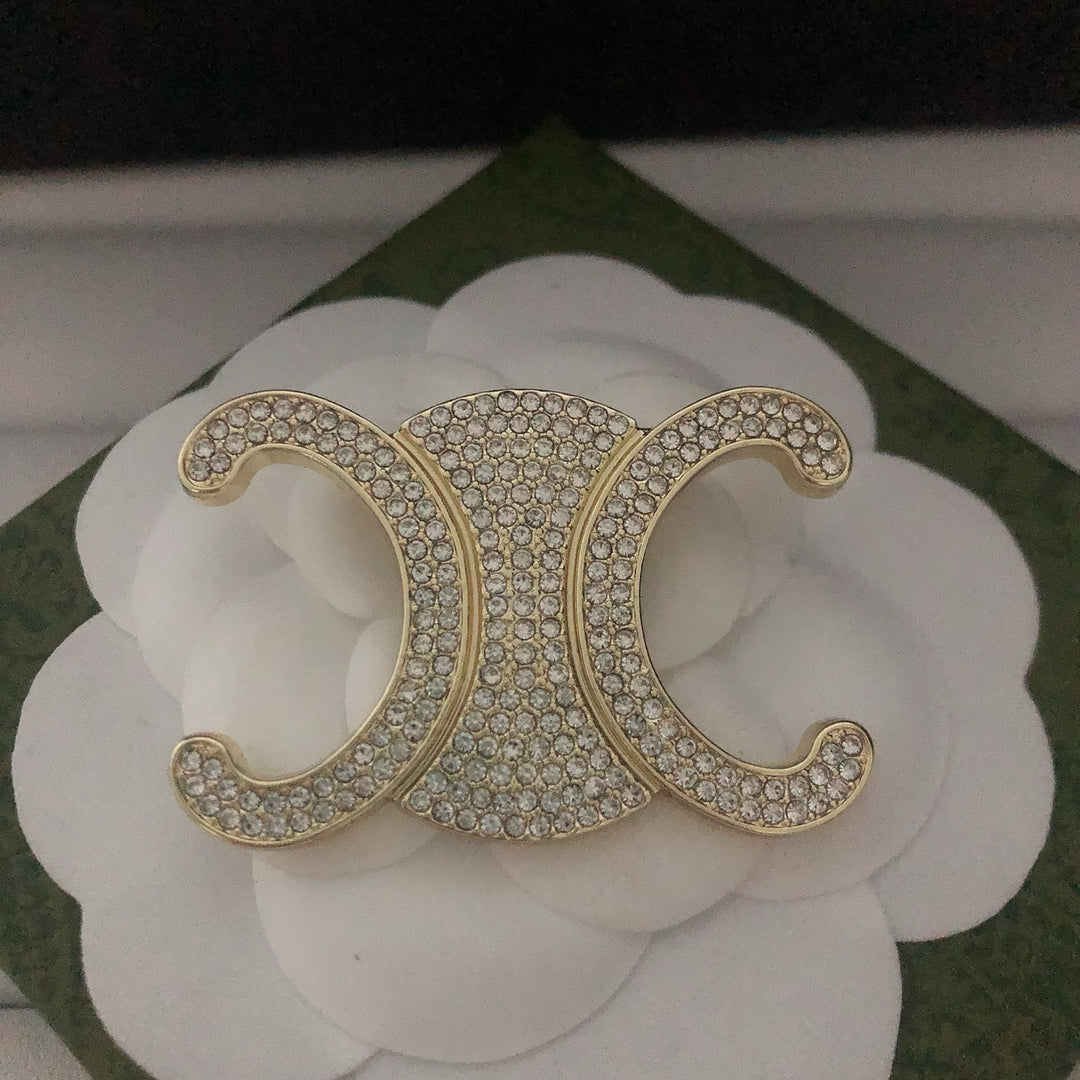 Exclusive Logo Rhinestone Brooch