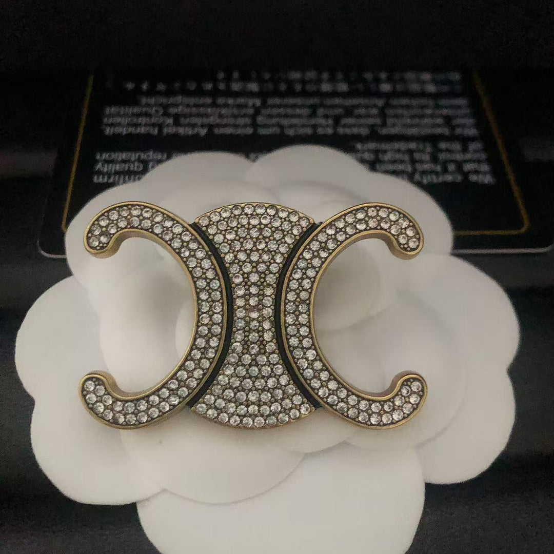 Exclusive Logo Rhinestone Brooch