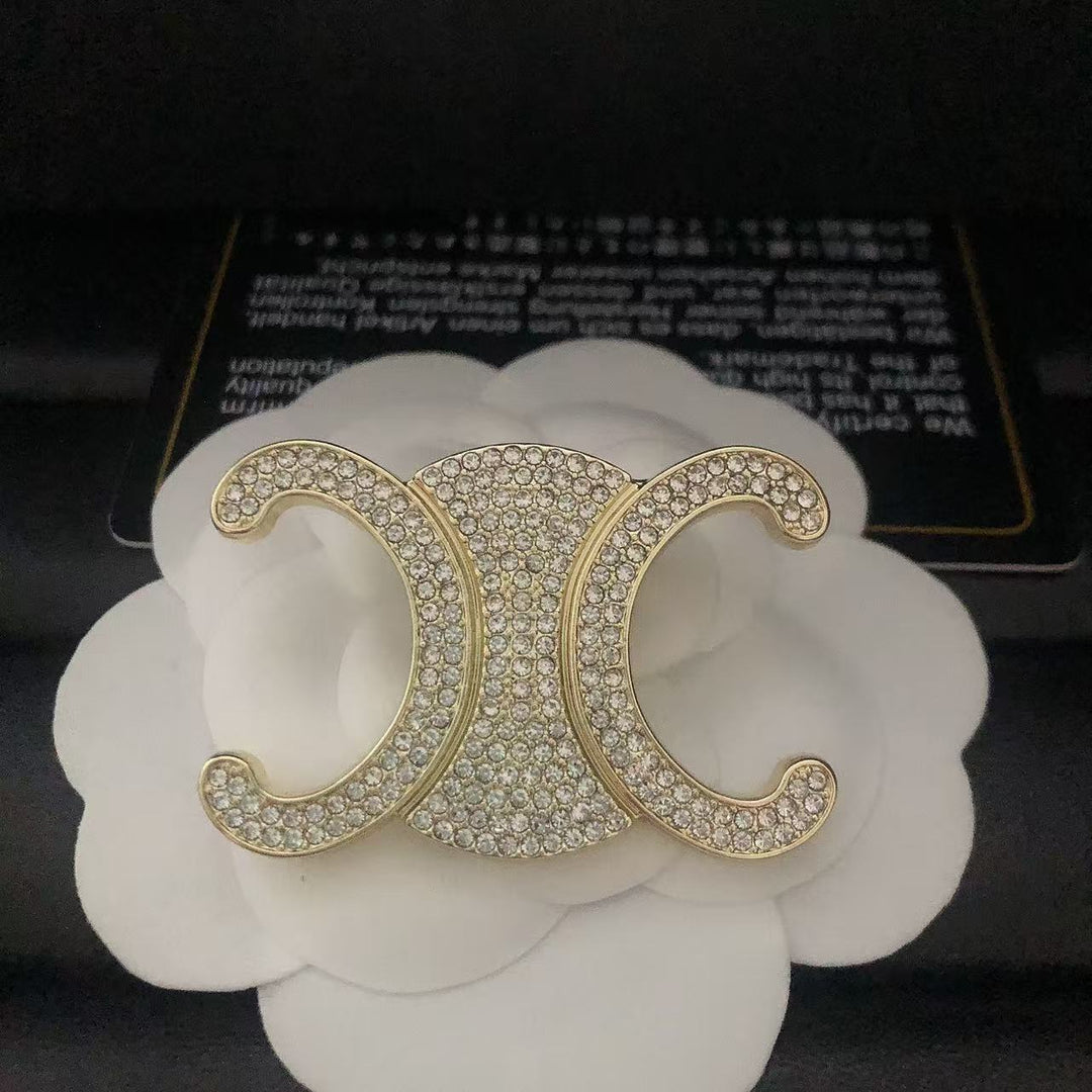 Exclusive Logo Rhinestone Brooch