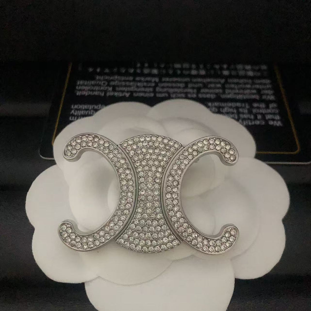 Exclusive Logo Rhinestone Brooch