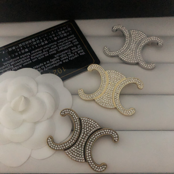 Exclusive Logo Rhinestone Brooch