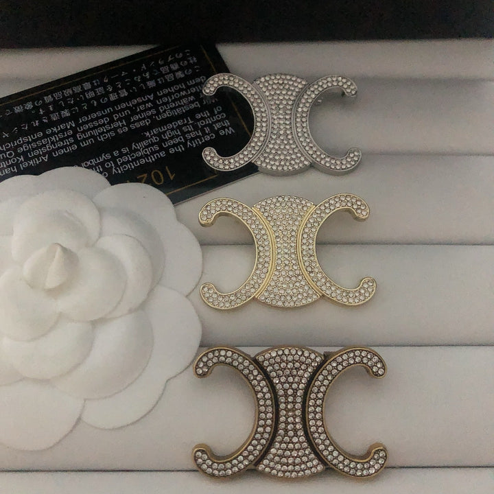 Exclusive Logo Rhinestone Brooch