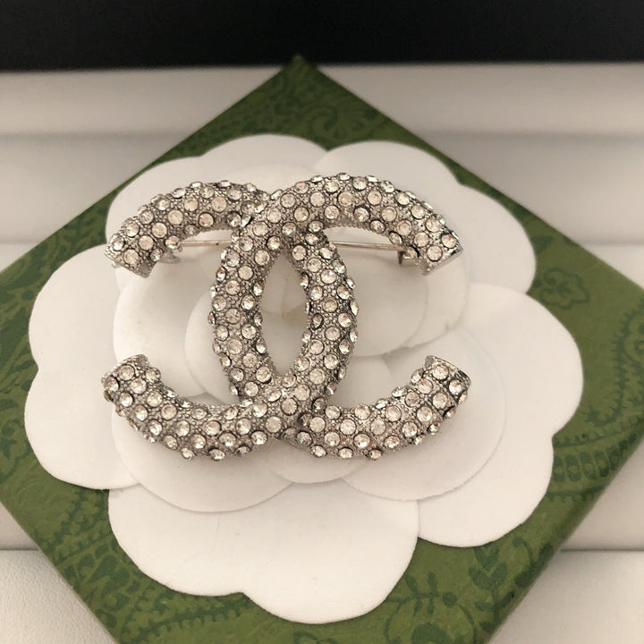 Elegant Reticulated Diamond Brooch