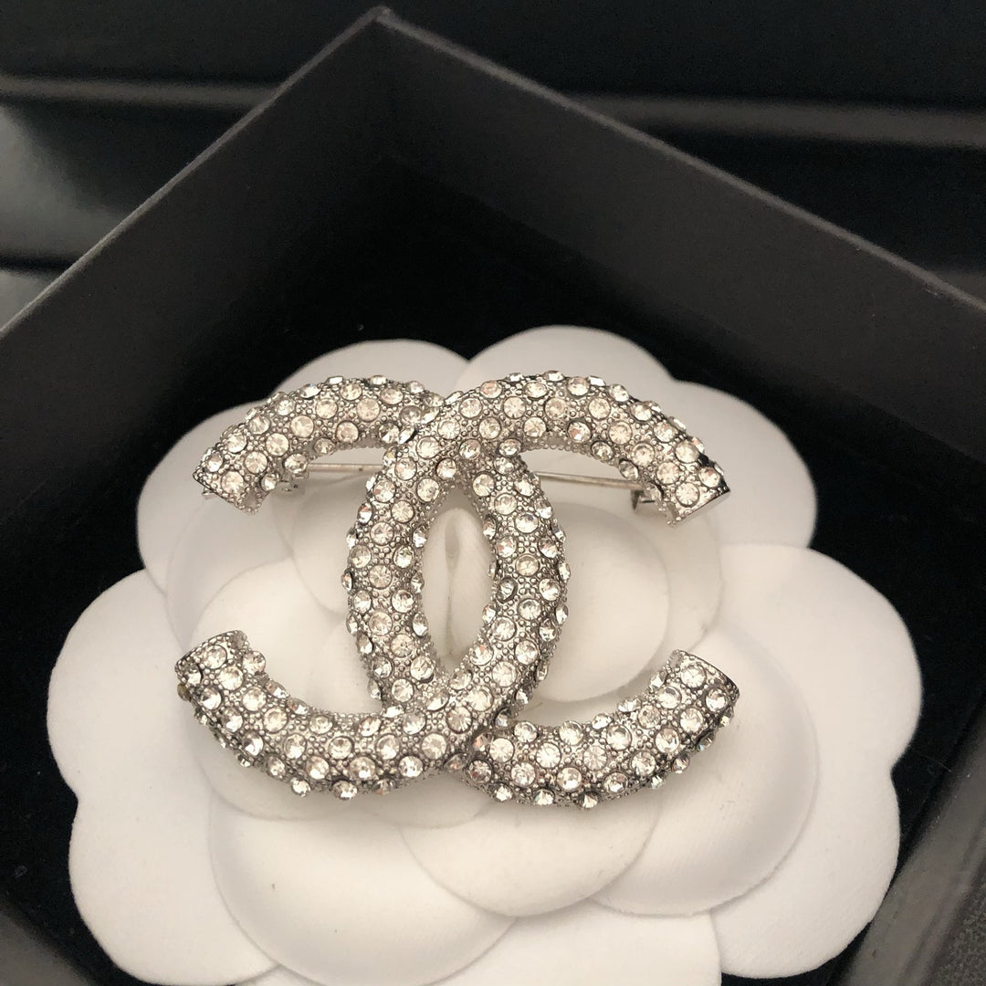 Elegant Reticulated Diamond Brooch