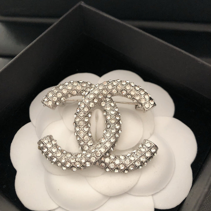 Elegant Reticulated Diamond Brooch