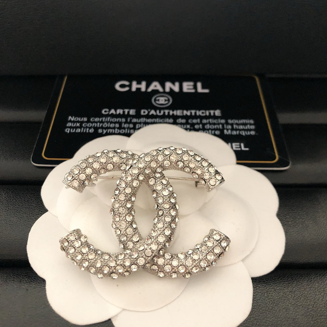 Elegant Reticulated Diamond Brooch