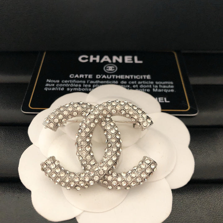 Elegant Reticulated Diamond Brooch