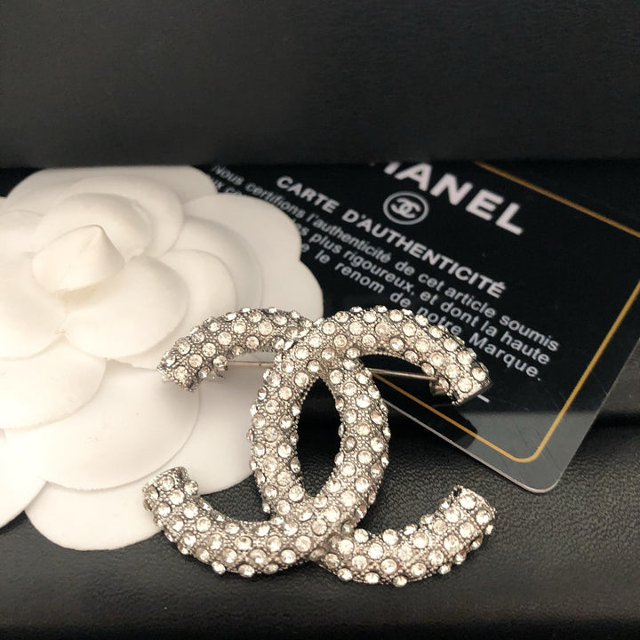 Elegant Reticulated Diamond Brooch
