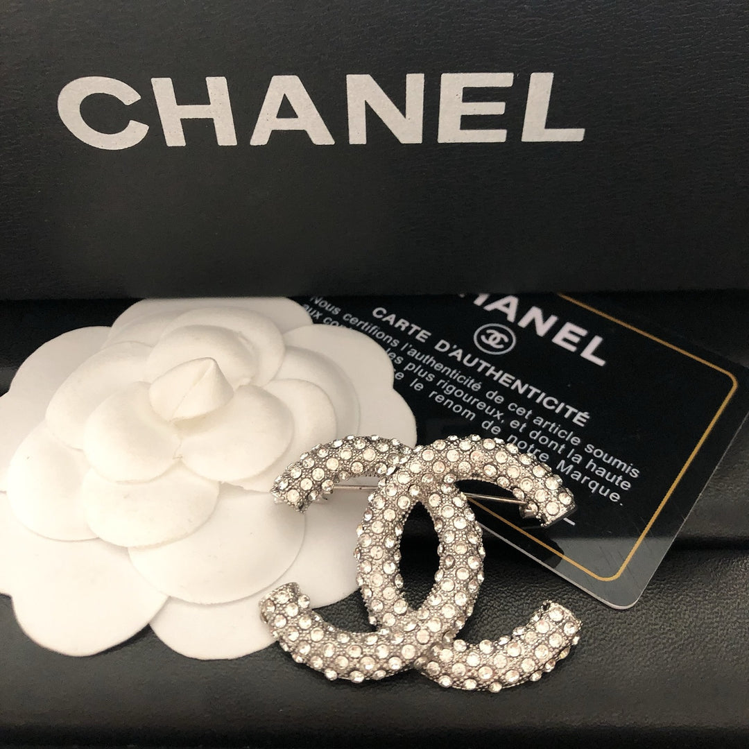 Elegant Reticulated Diamond Brooch