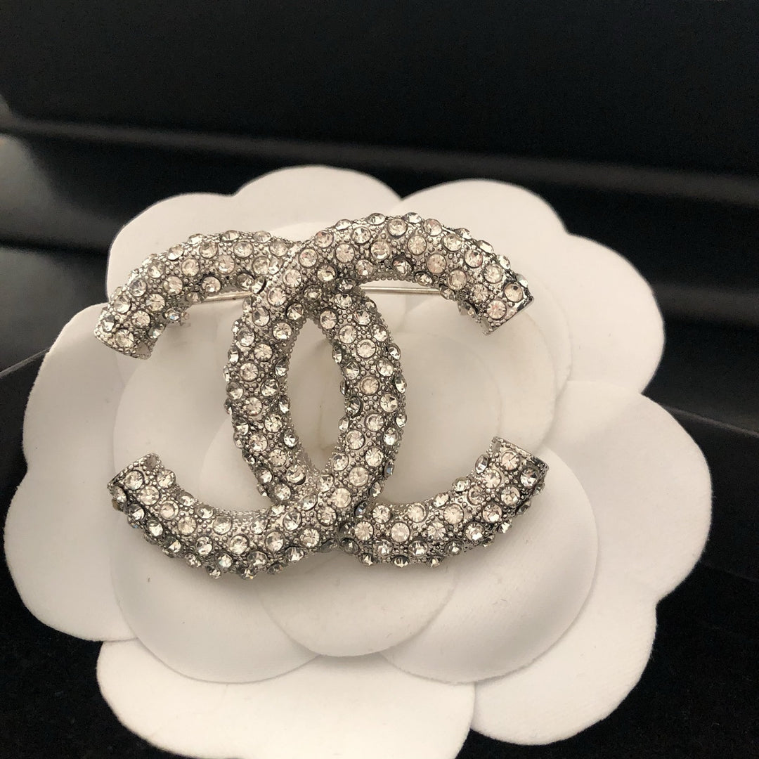 Elegant Reticulated Diamond Brooch