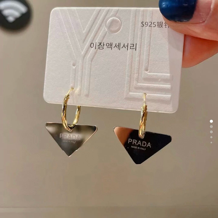 Delicate inverted triangle round titanium earrings