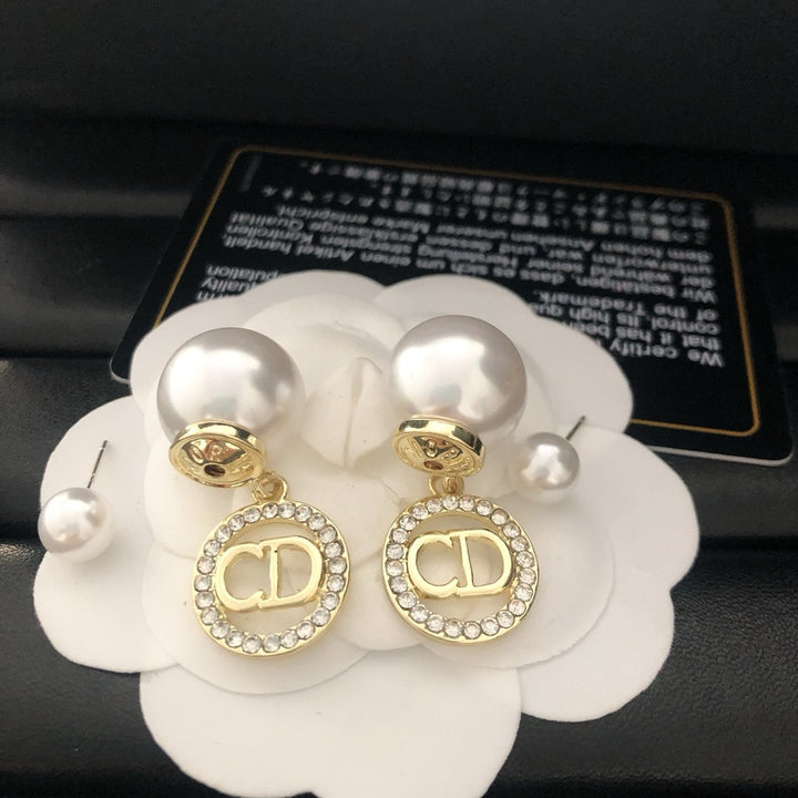 Pearl and rhinestone earrings