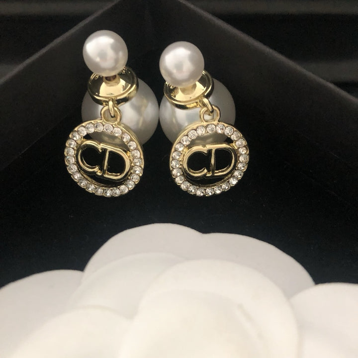 Pearl and rhinestone earrings