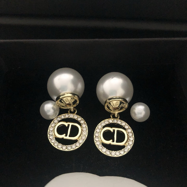 Pearl and rhinestone earrings