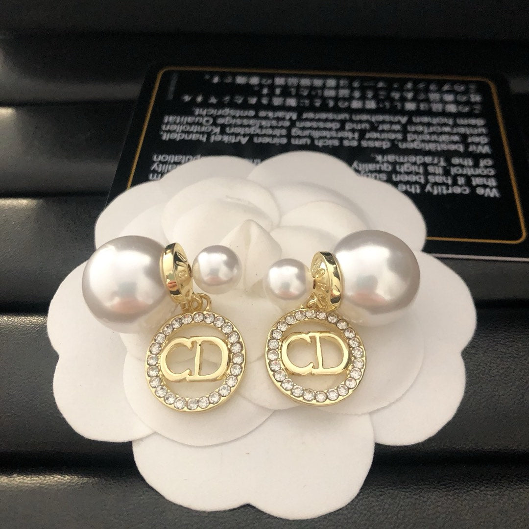 Pearl and rhinestone earrings