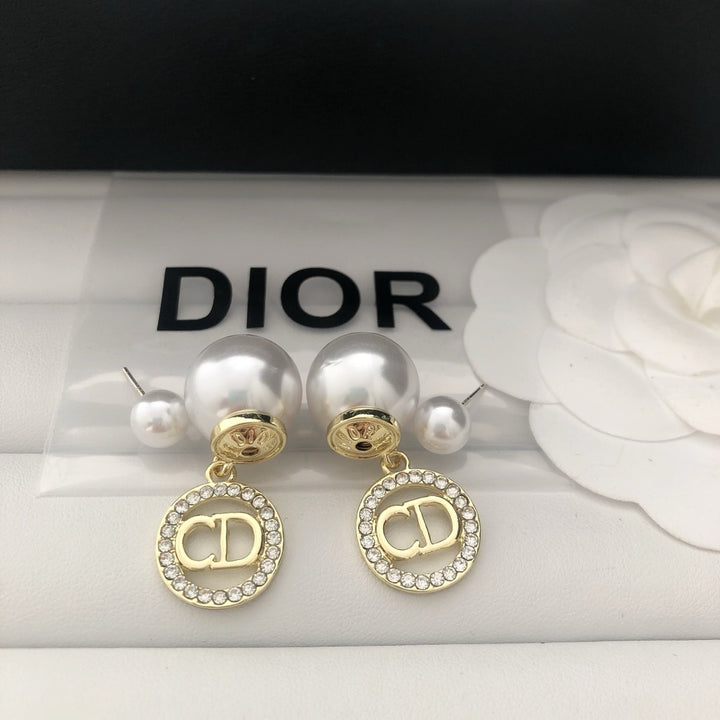 Pearl and rhinestone earrings