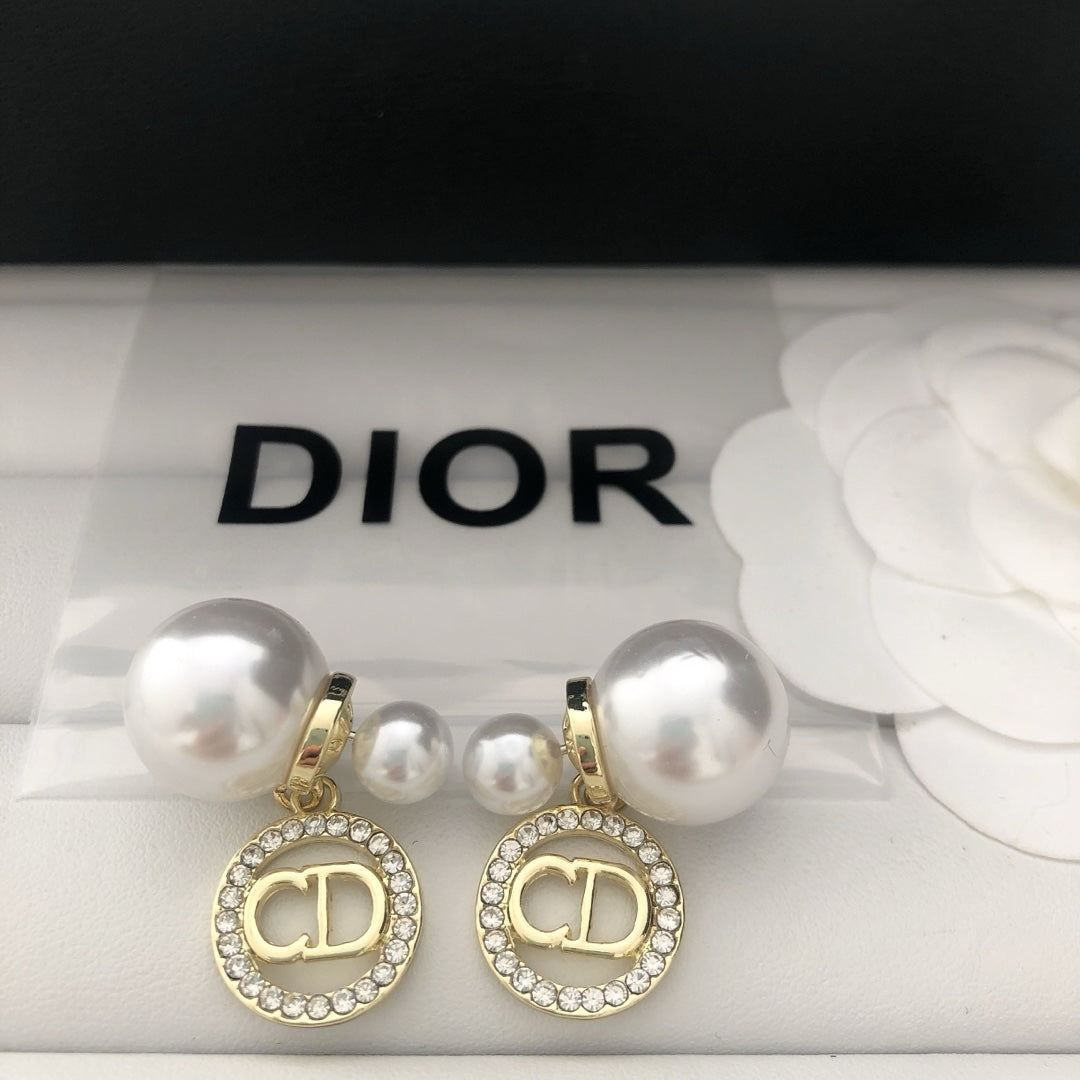 Pearl and rhinestone earrings