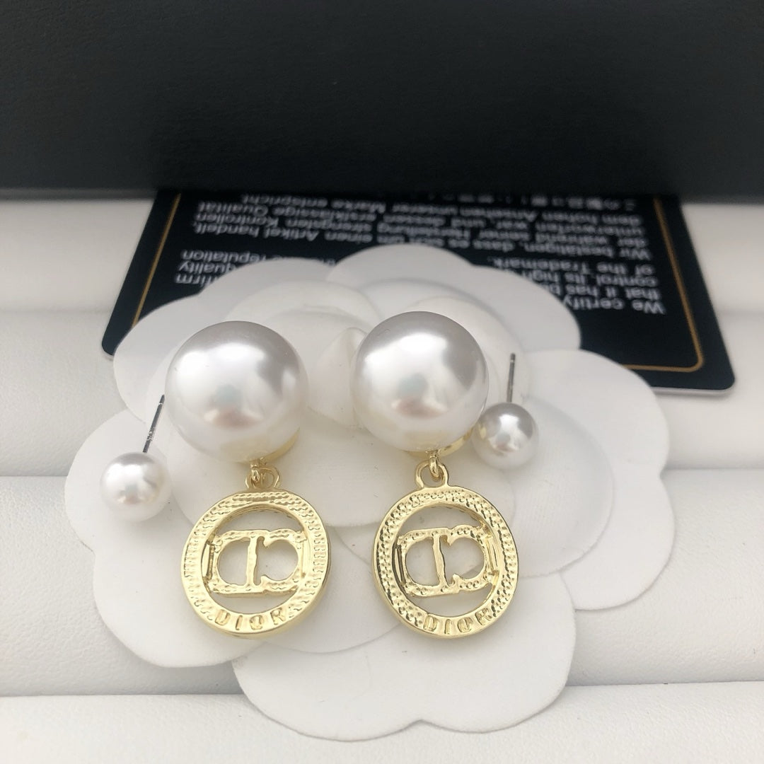 Pearl and rhinestone earrings