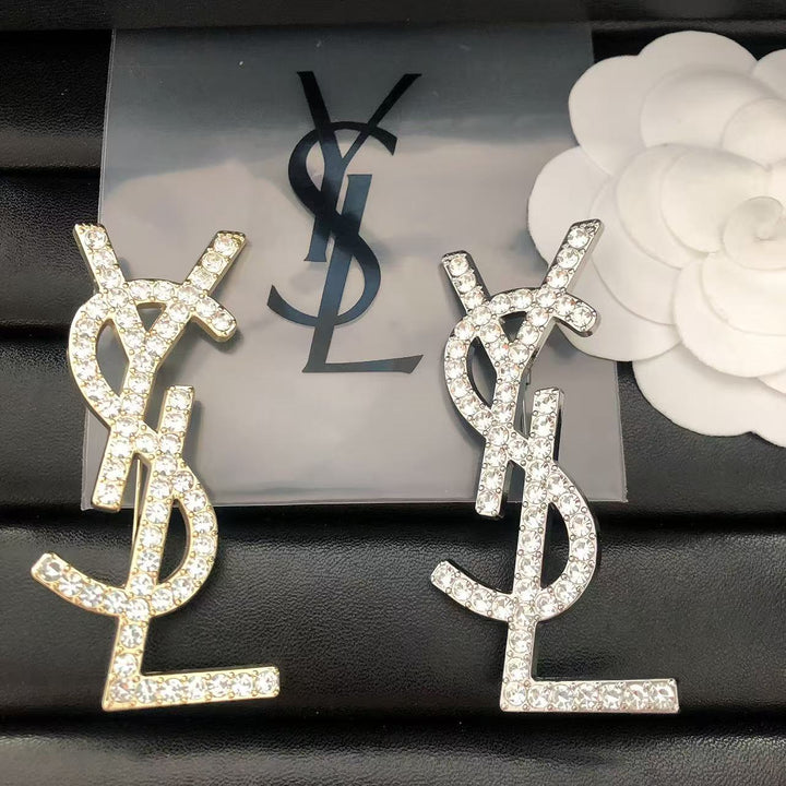 Single row diamond brooch