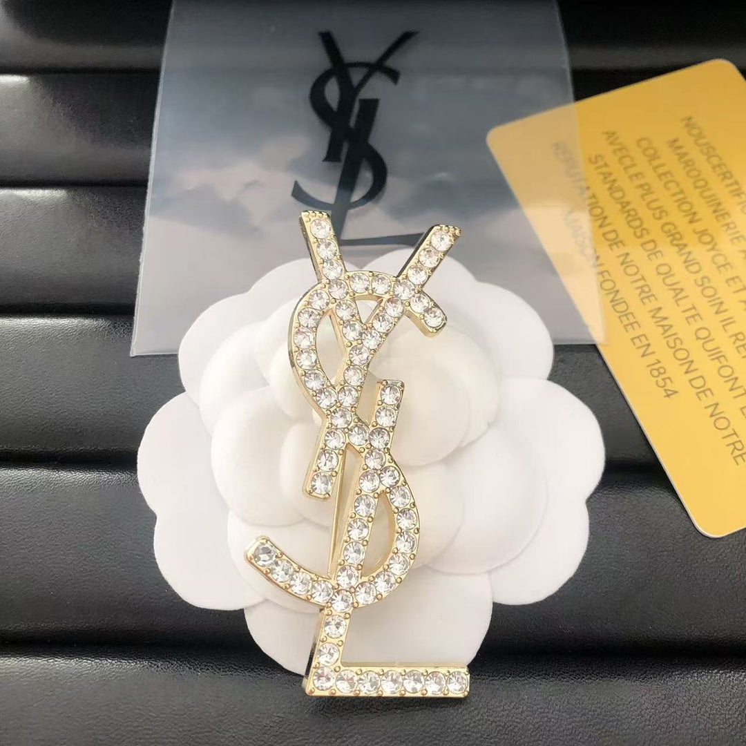 Single row diamond brooch