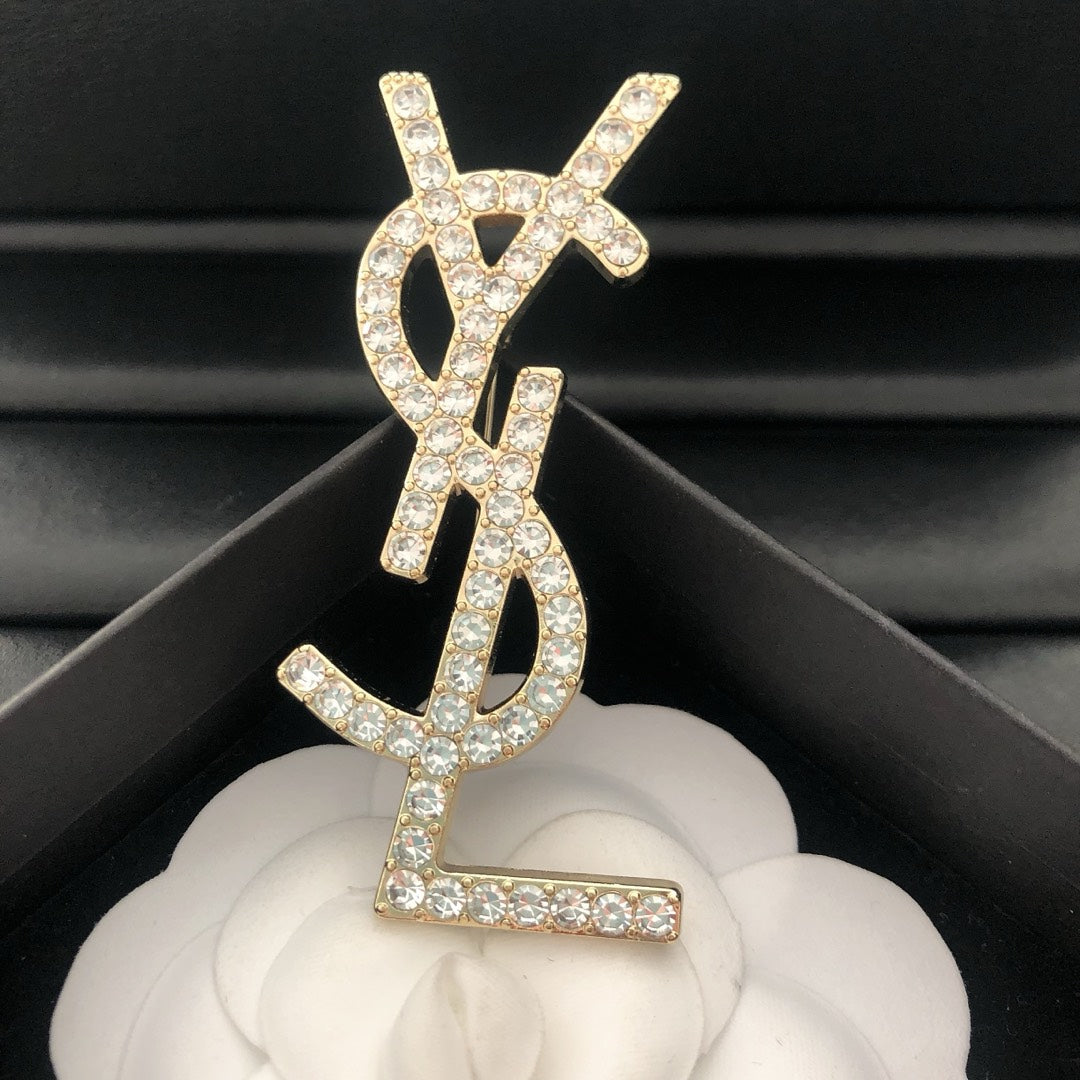 Single row diamond brooch