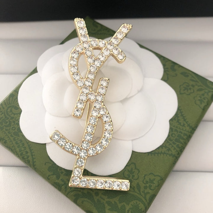 Single row diamond brooch