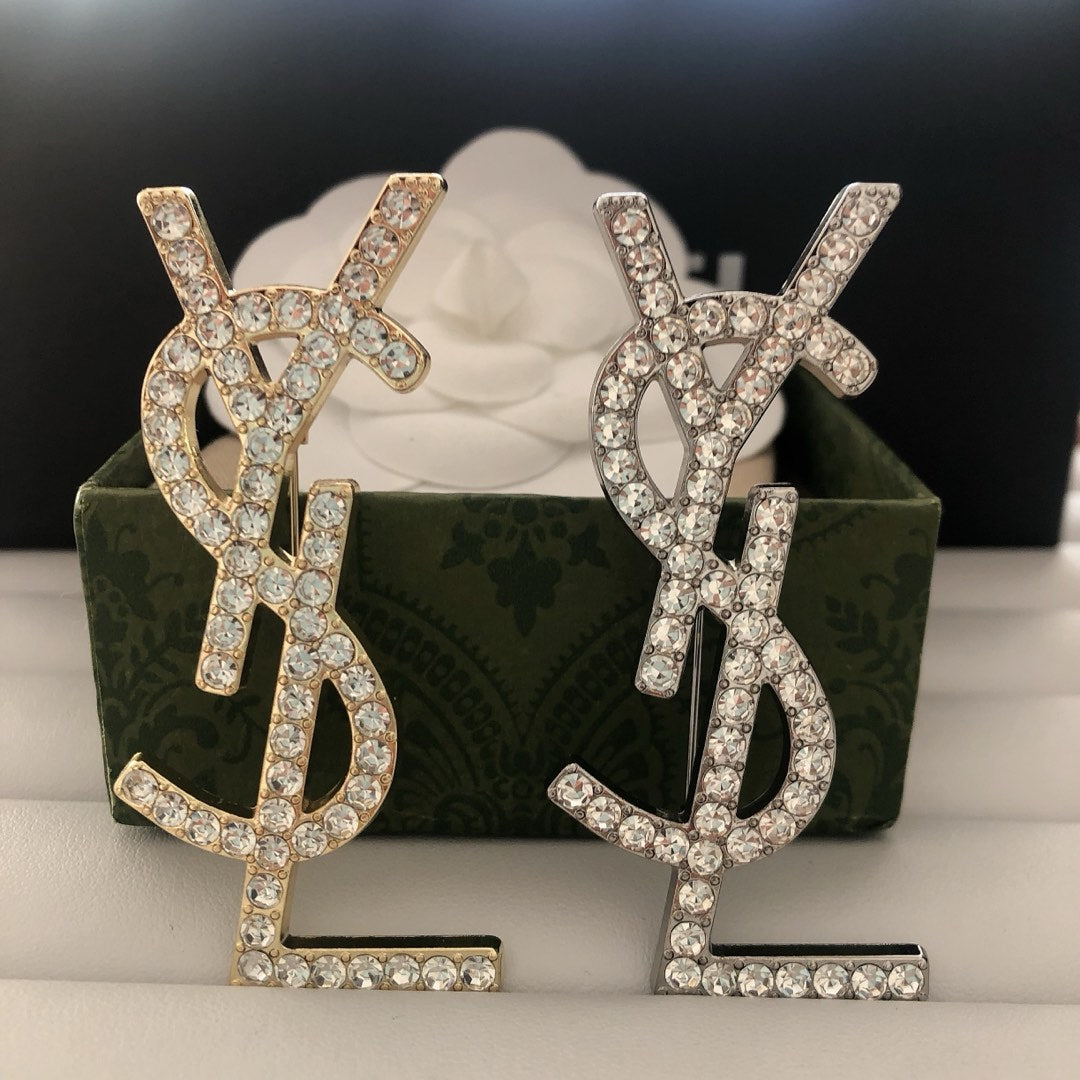 Single row diamond brooch