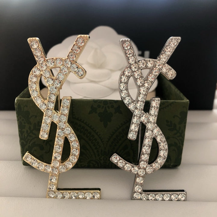 Single row diamond brooch