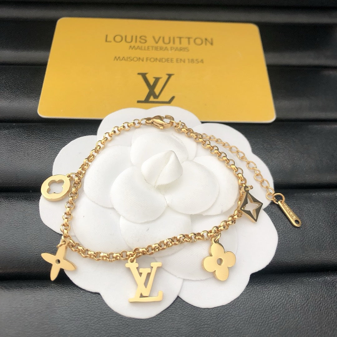 Emblematic Gold Charm Bangle