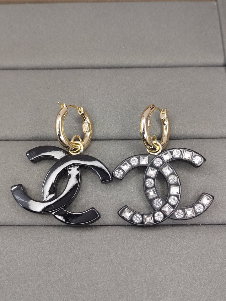 Fashion CC diamond encrusted black acrylic earrings