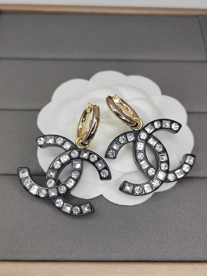 Fashion CC diamond encrusted black acrylic earrings