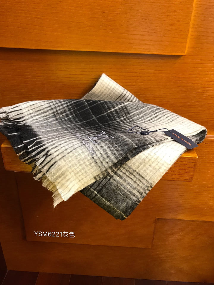 fashion men and women with the same striped fall and winter scarf