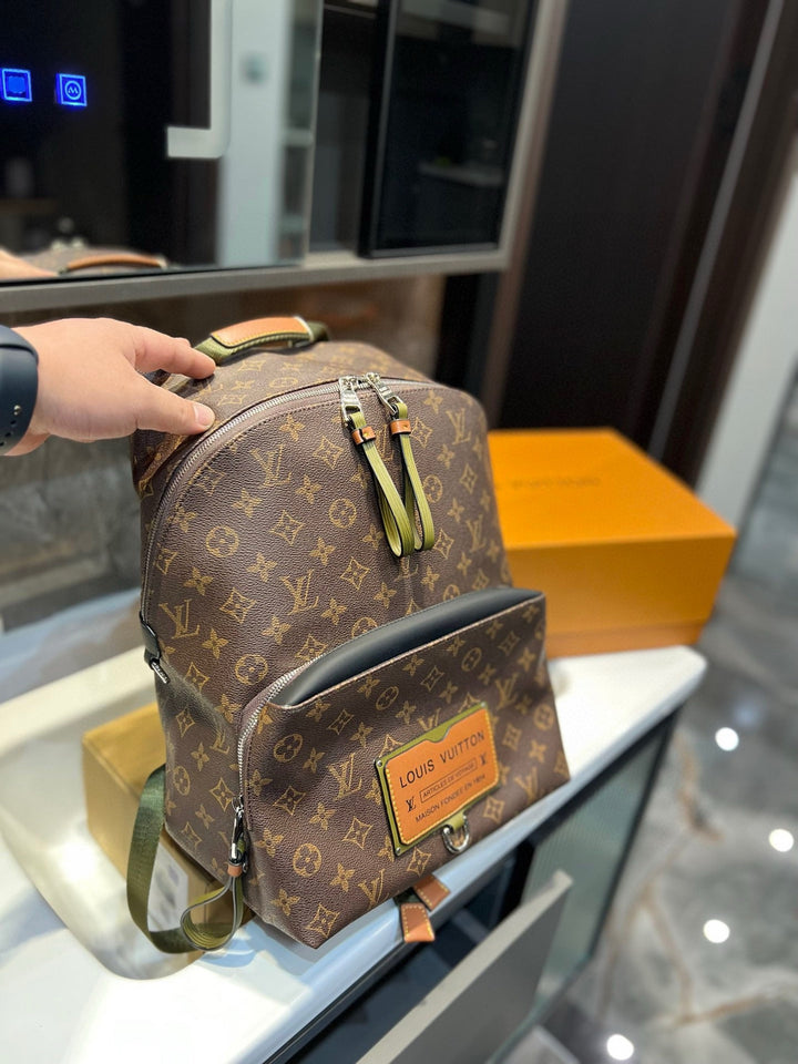 Two-color monogrammed travel backpack