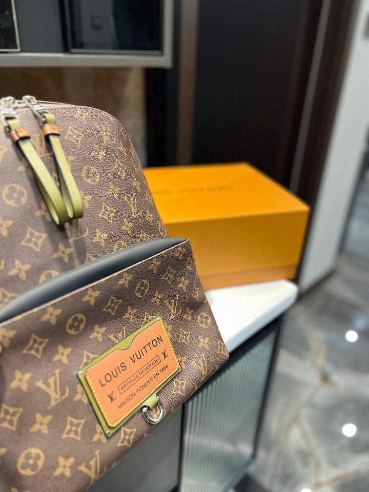 Two-color monogrammed travel backpack