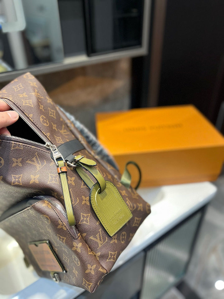 Two-color monogrammed travel backpack