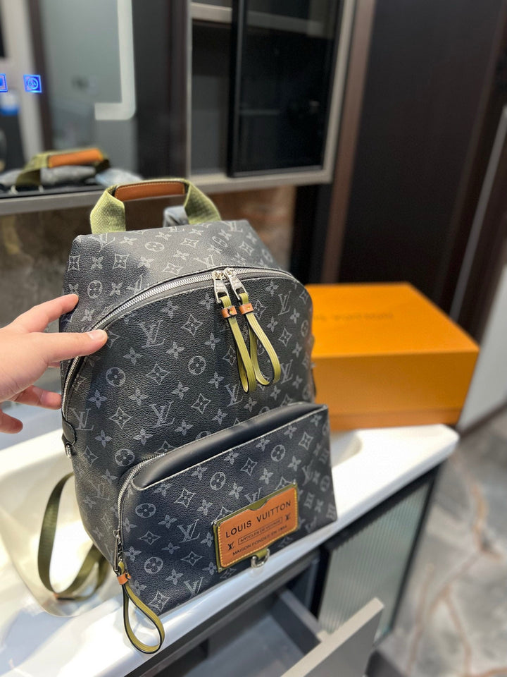 Two-color monogrammed travel backpack