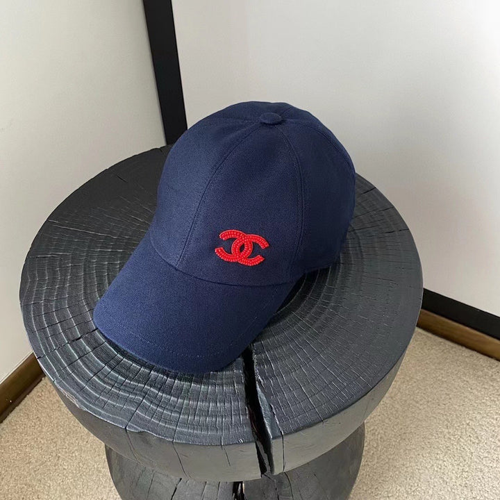 Red embroidered bead logo cap