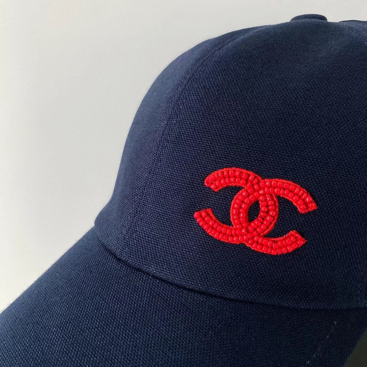 Red embroidered bead logo cap