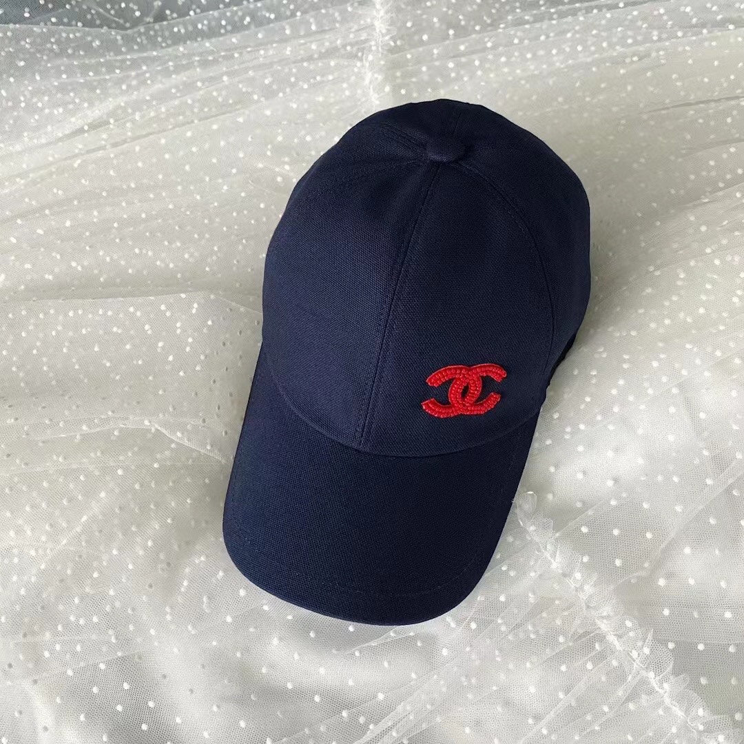 Red embroidered bead logo cap