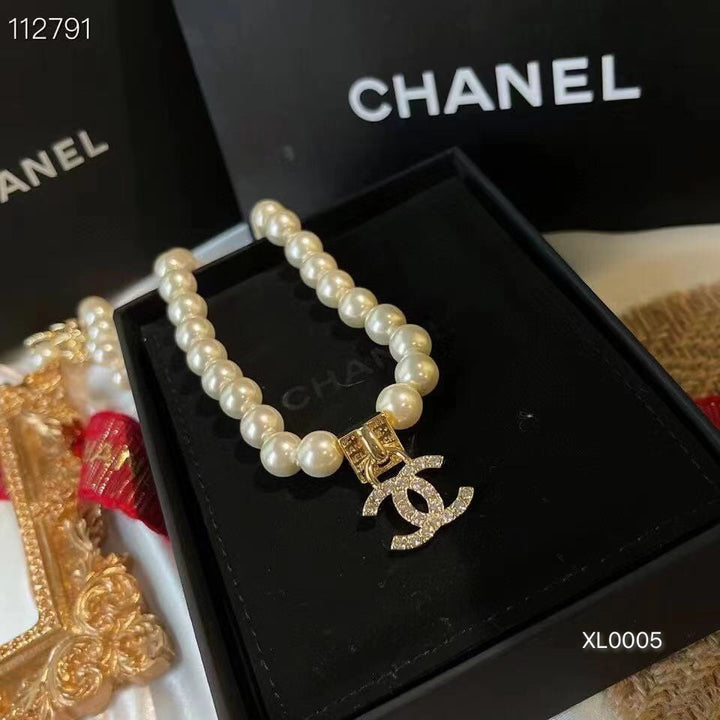 Elegant pearl chain charm