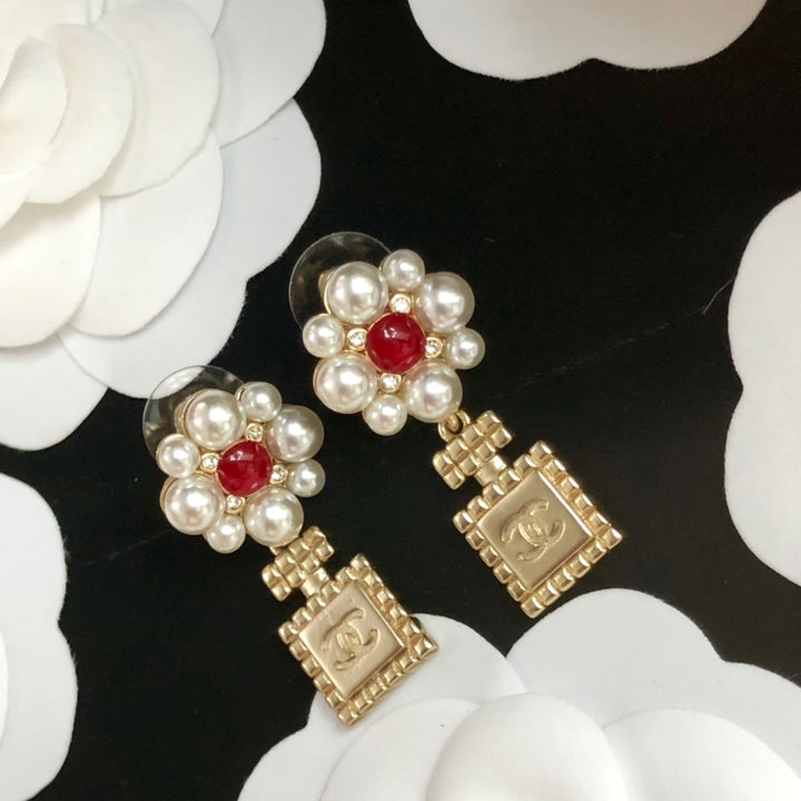 perfume bottle pearl earrings