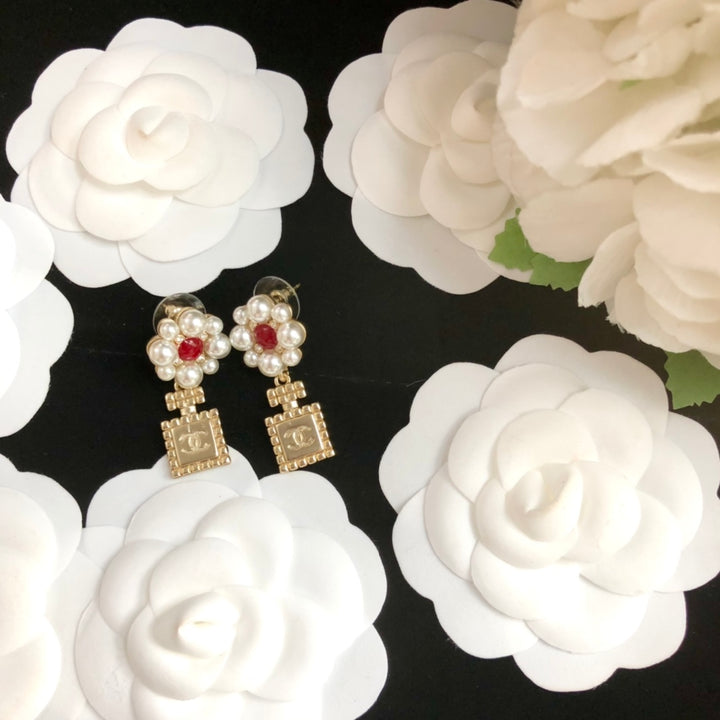 perfume bottle pearl earrings