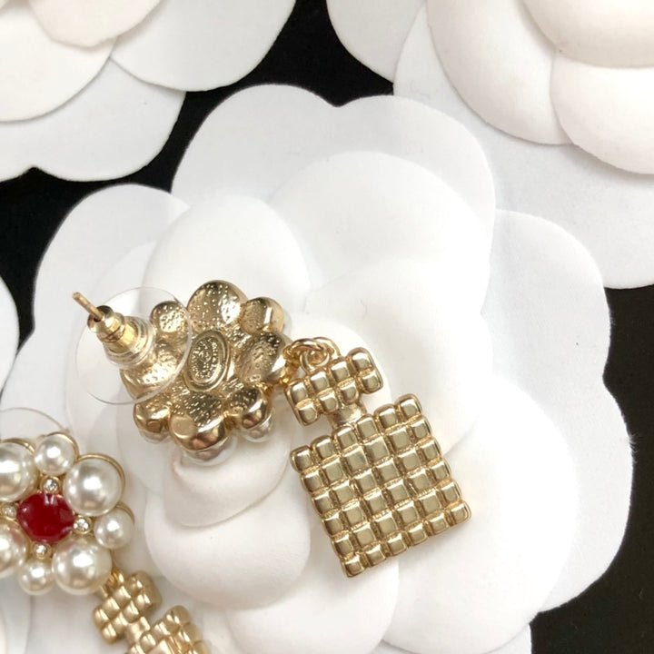 perfume bottle pearl earrings